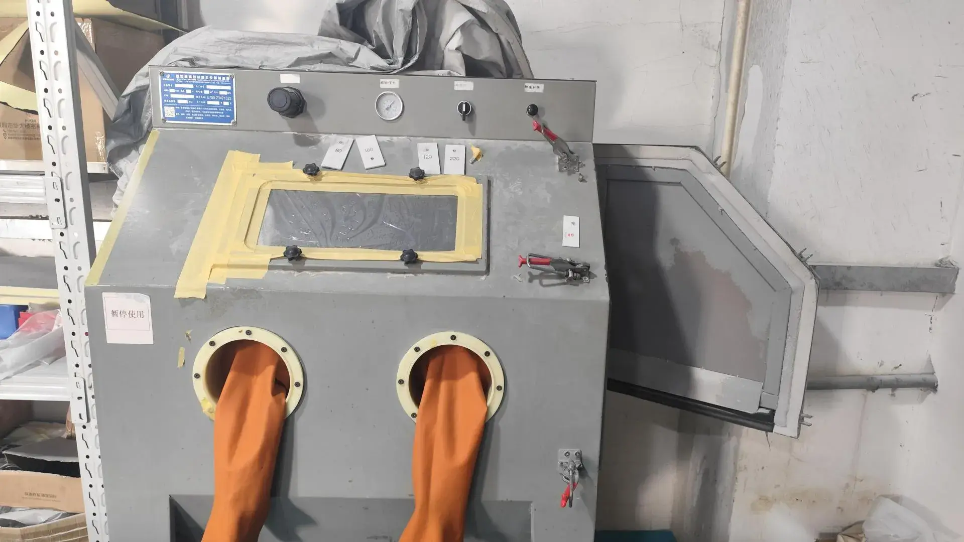 Our heavy-duty sandblasting machine used to create a uniform matte finish and prepare surfaces for coating or anodizing.